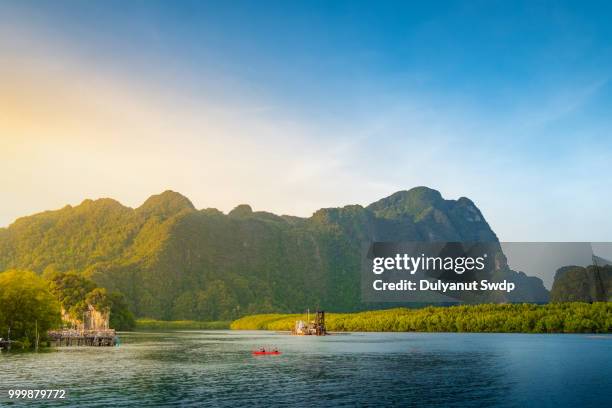 boat on beach of island in krabi province, thailand - province stock pictures, royalty-free photos & images