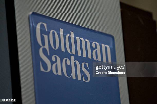 Goldman Sachs Group Inc. Logo hangs on the floor of the New York Stock Exchange in New York, U.S., on Wednesday, May 19, 2010. Goldman Sachs Group...