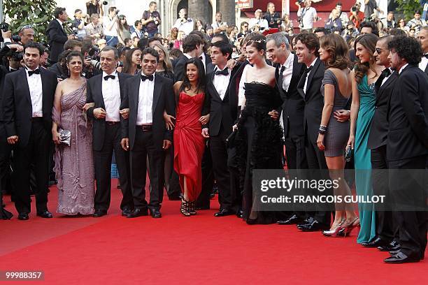French director Olivier Assayas and with the cast of his film "Carlos" arrive for the screening of "Poetry" presented in competition at the 63rd...