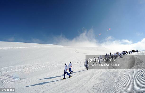 French national football team's players train at the top of the Tignes glacier on May 19, 2010 in the French Alps. The French national team should...