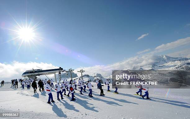 French national football team's players gather at the top of the Tignes glacier upon their arrival on May 19, 2010 in the French Alps. The French...