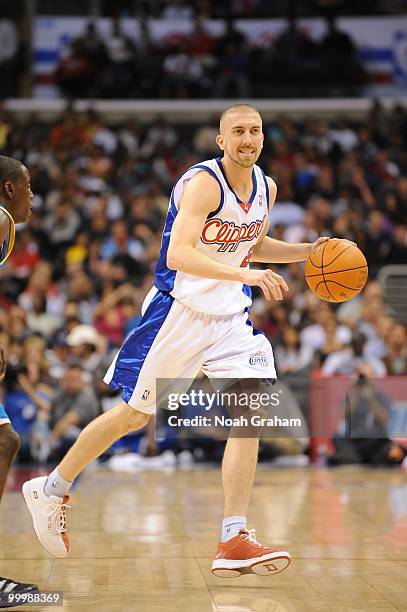 Steve Blake of the Los Angeles Clippers dribbles against the New Orleans Hornets during the game at Staples Center on March 15, 2010 in Los Angeles,...