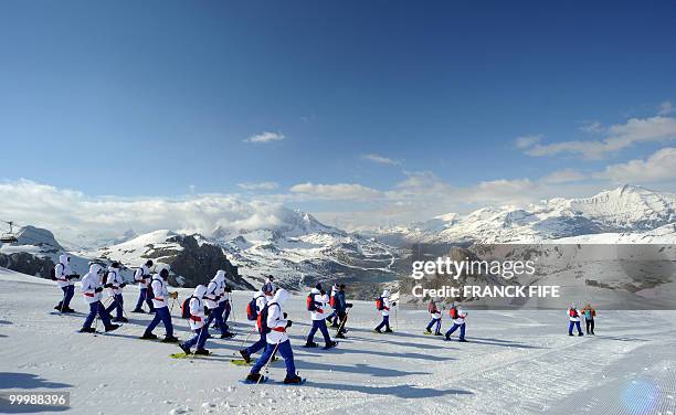 French national football team's players train at the top of the Tignes glacier on May 19, 2010 in the French Alps. The French national team should...