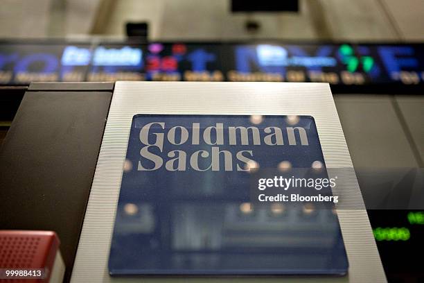 Goldman Sachs Group Inc. Logo hangs on the floor of the New York Stock Exchange in New York, U.S., on Wednesday, May 19, 2010. Goldman Sachs Group...