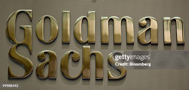 Goldman Sachs Group Inc. Logo hangs on the floor of the New York Stock Exchange in New York, U.S., on Wednesday, May 19, 2010. Goldman Sachs Group...