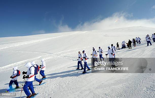 French national football team's players train at the top of the Tignes glacier on May 19, 2010 in the French Alps. The French national team should...