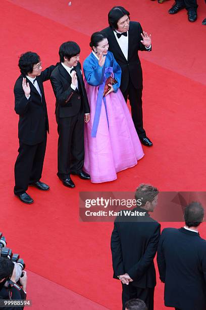 Director Chang-Dong Lee , actress Jeong-hee Yoon ,actor David Lee, producer Jun-Dong Lee attend the "Poetry" Premiere at the Palais des Festivals...