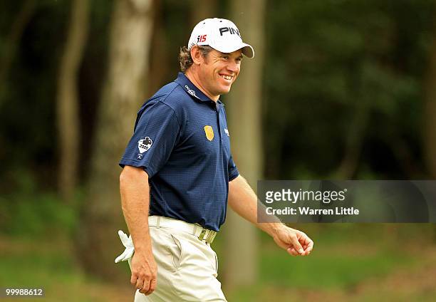 Lee Westwood of England smiles during the Pro-Am round prior to the BMW PGA Championship on the West Course at Wentworth on May 19, 2010 in Virginia...