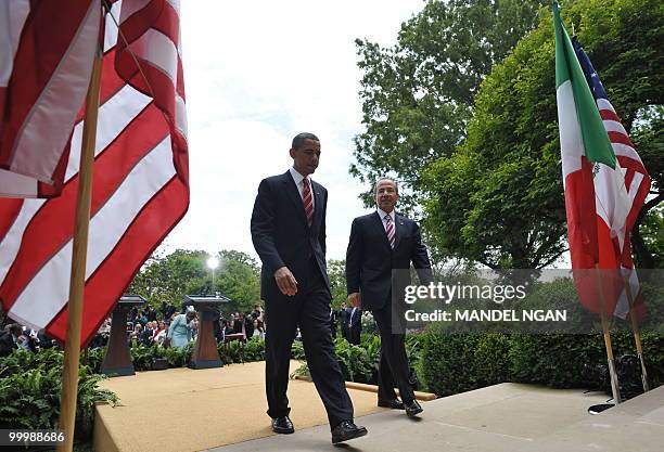 Mexico�s President Felipe Calderón and US President Barack Obama leave after a joint press conference May 19, 2010 in the Rose Garden of the White...