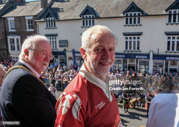 Labour Leader Jeremy Corbyn stands on the balcony of the County Hotel watching as colliery bands pass below during the 134th Durham Miners’ Gala on...