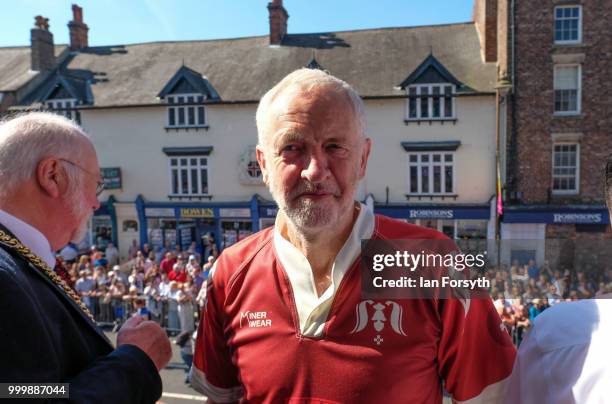 Labour Leader Jeremy Corbyn stands on the balcony of the County Hotel watching as colliery bands pass below during the 134th Durham Miners’ Gala on...