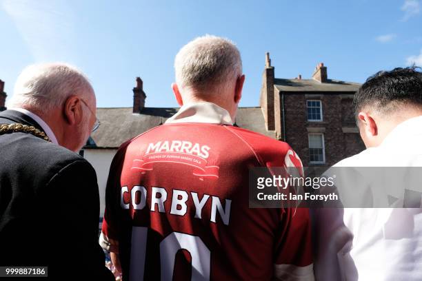 Labour Leader Jeremy Corbyn stands on the balcony of the County Hotel watching as colliery bands pass below during the 134th Durham Miners’ Gala on...