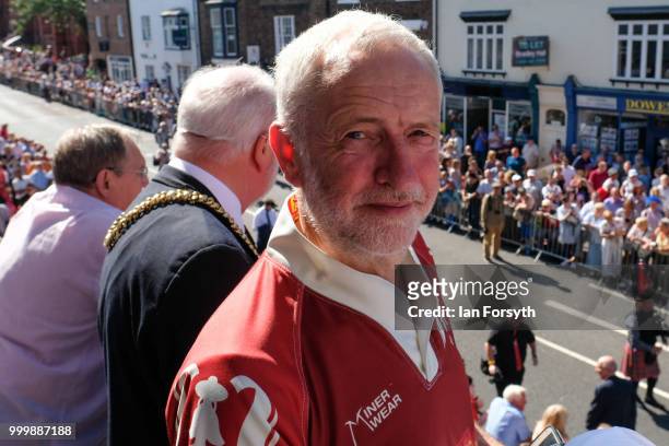Labour Leader Jeremy Corbyn stands on the balcony of the County Hotel watching as colliery bands pass below during the 134th Durham Miners’ Gala on...
