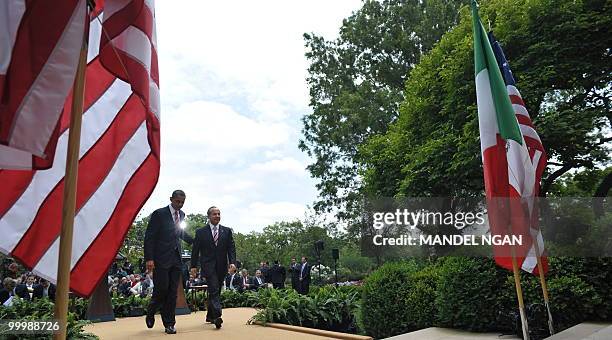 Mexico�s President Felipe Calderón and US President Barack Obama make their way from a joint press conference May 19, 2010 in the Rose Garden of the...