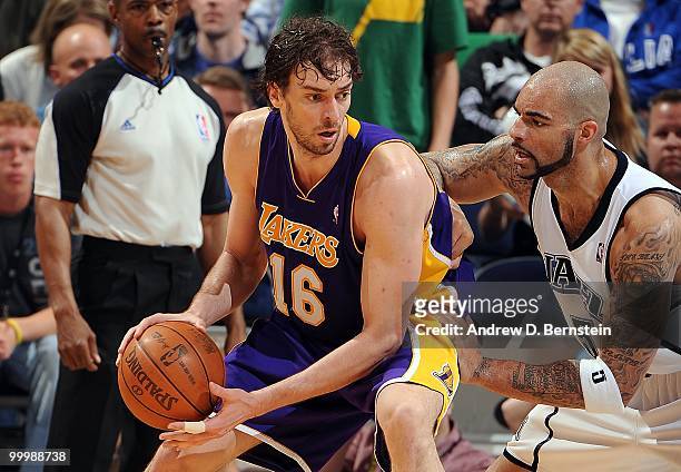 Pau Gasol of the Los Angeles Lakers dribbles against Carlos Boozer of the Utah Jazz in Game Four of the Western Conference Semifinals during the 2010...