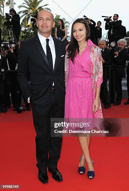 Actor Billy Zane and guest attend the premiere of 'Poetry' held at the Palais des Festivals during the 63rd Annual International Cannes Film Festival...