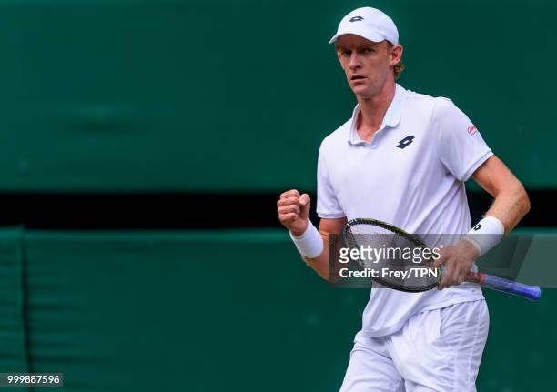 Kevin Anderson of South Africa in action against John Isner of the United States in the semi final of the gentlemen's singles at the All England Lawn...