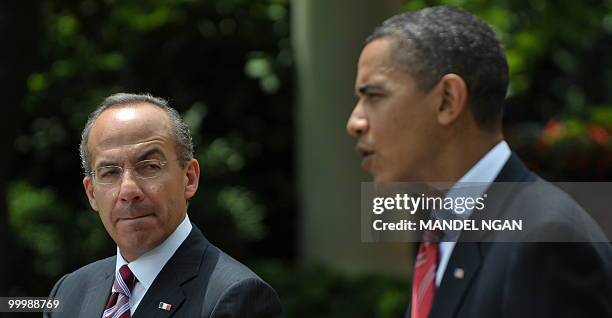 Mexico�s President Felipe Calderón watches as US President Barack Obama speaks speaks during a joint press conference May 19, 2010 in the Rose Garden...