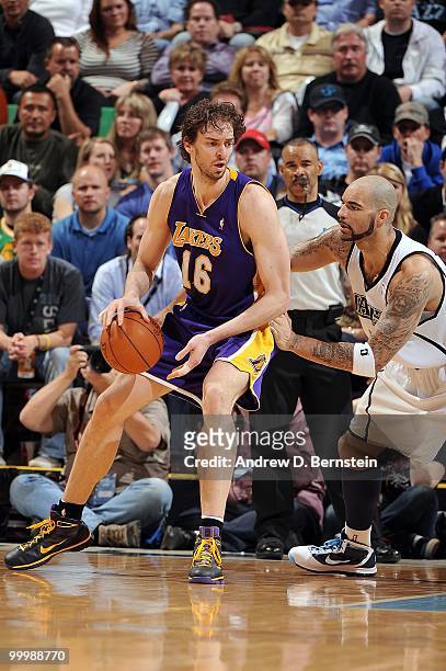Pau Gasol of the Los Angeles Lakers dribbles against Carlos Boozer of the Utah Jazz in Game Four of the Western Conference Semifinals during the 2010...