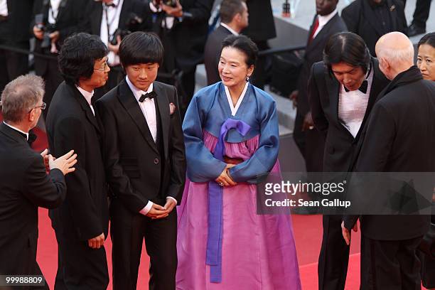 Director Chang-Dong Lee , actress Jeong-hee Yoon ,actor David Lee, producer Jun-Dong Lee are greeted by General Delegate Thierry Fremaux attend the...