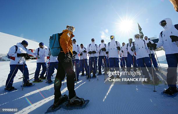 French national football team's players gather at the top of the Tignes glacier on May 19, 2010 in the French Alps. The French national team should...