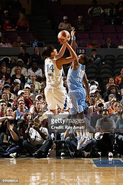 Nicole Powell of the New York Liberty shoots against Epiphanny Prince of the Chicago Sky during the WNBA game on May 16, 2010 at Madison Square...