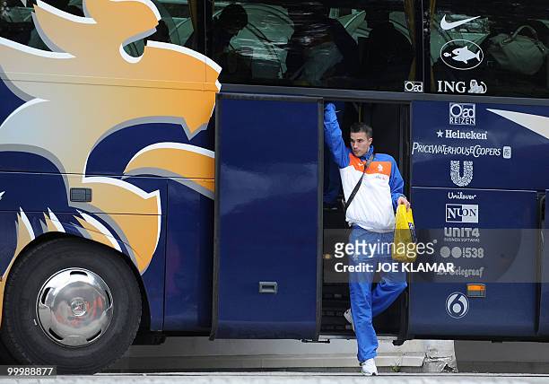 Dutch football player Robin van Persie leaves the bus as he arrives with Netherlands national football team at their training camp in Tirolian...