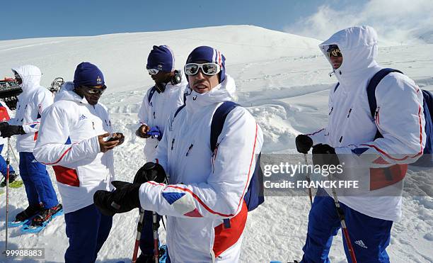 French national football team's forward Franck Ribery poses near teammates forward Florent Malouda , defender Eric Abidal and midfielder Jeremy...