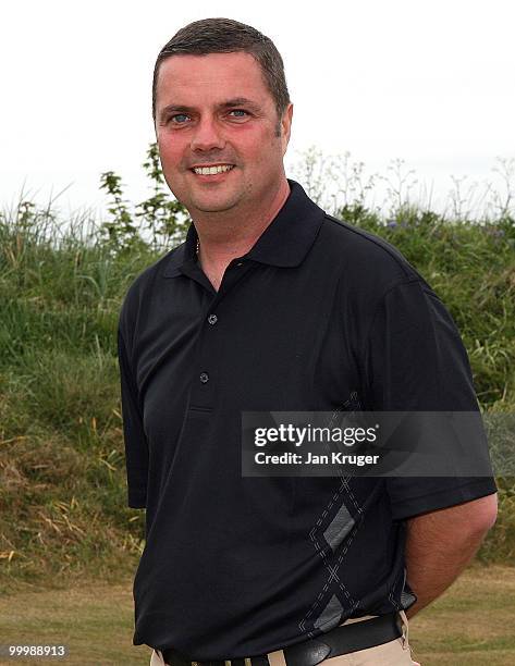 Winner Alex Rowland of Hawarden is photographed at the end of play during the Virgin Atlantic PGA National Pro-Am Championship regional final at St...