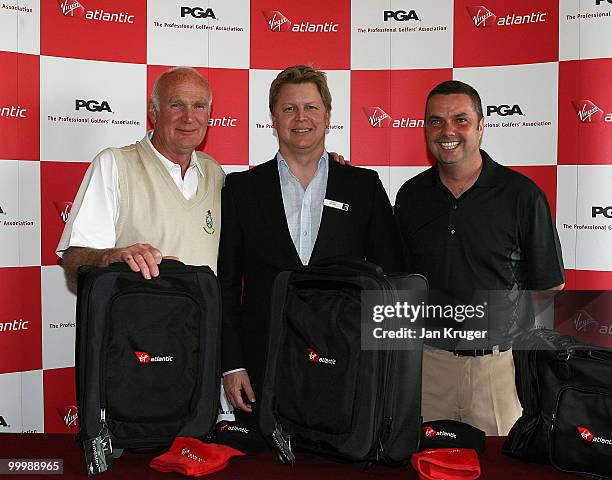 Winners, Andre Roberts and Alex Rowland of Hawarden pose for a picture with James Merchant of Virgin during the Virgin Atlantic PGA National Pro-Am...