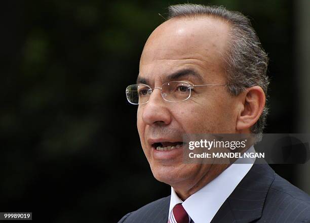 Mexico�s President Felipe Calderón speaks during a joint press conference with US President Barack Obama May 19, 2010 in the Rose Garden of the White...