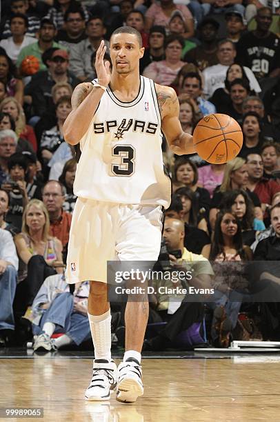 George Hill of the San Antonio Spurs drives the ball against the Orlando Magic during the game on April 2, 2010 at the AT&T Center in San Antonio,...