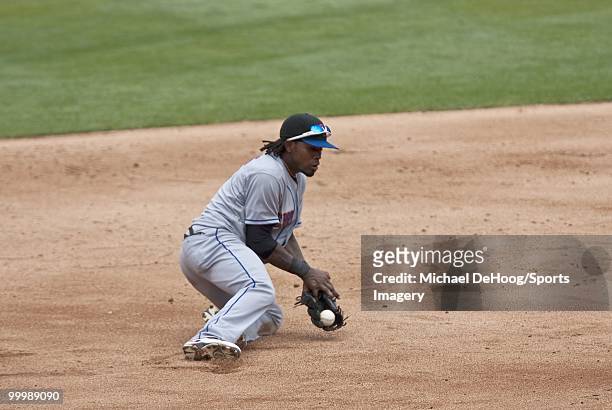 Jose Reyes of the New York Mets fields a ball during a MLB game against the Florida Marlins in Sun Life Stadium on May 16, 2010 in Miami, Florida.