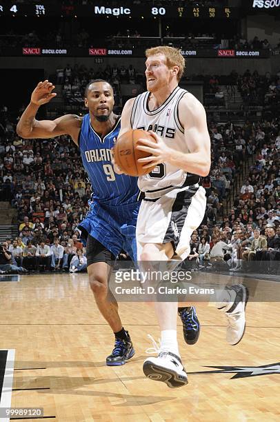 Matt Bonner of the San Antonio Spurs drives the ball against Rashard Lewis of the Orlando Magic during the game on April 2, 2010 at the AT&T Center...