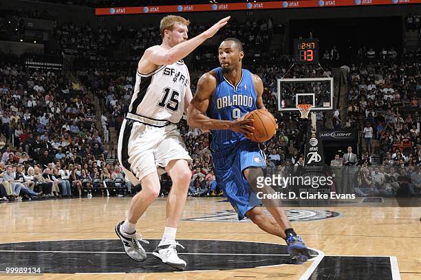 Rashard Lewis of the Orlando Magic drives the ball against Matt Bonner of the San Antonio Spurs during the game on April 2, 2010 at the AT&T Center...