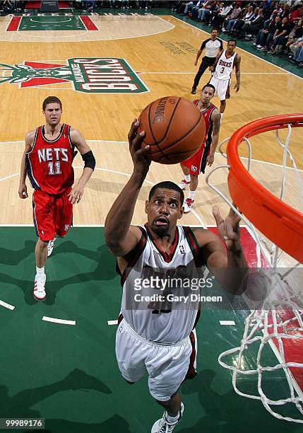 Kurt Thomas of the Milwaukee Bucks puts a shot up against the New Jersey Nets during the game at the Bradley Center on April 7, 2010 in Milwaukee,...