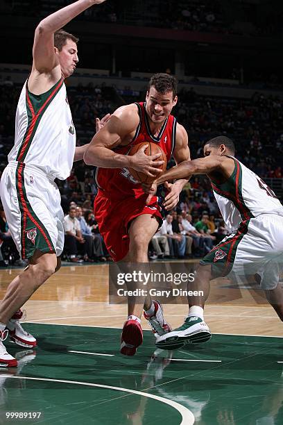 Kris Humphries of the New Jersey Nets drives to the basket against the Milwaukee Bucks during the game at the Bradley Center on April 7, 2010 in...