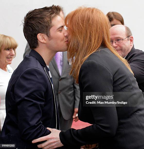 Joe McElderry kisses Sarah Ferguson, The Duchess of York as they attend the opening of the Teenage Cancer Trust Unit at the Great North Children's...