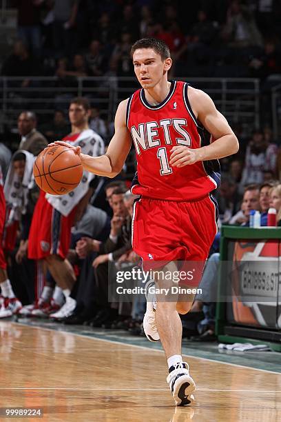 Chris Quinn of the New Jersey Nets drives the ball downcourt against the Milwaukee Bucks during the game at the Bradley Center on April 7, 2010 in...