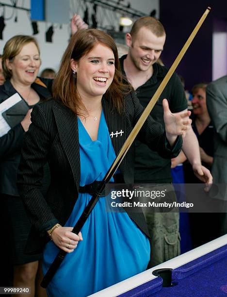 Princess Eugenie of York plays pool as she attends the opening of the Teenage Cancer Trust Unit at the Great North Children's Hospital on May 19,...