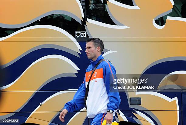 Robin van Persie gets out of a bus during the Netherlands team arrival for their training camp in Tirolian village of Seefeld in Austria on 19 May...