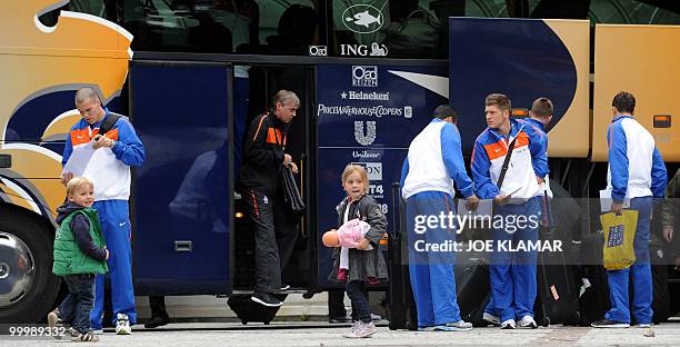 Players get out of a bus during the Dutch team's arrival for their training camp in Tirolian village of Seefeld in Austria on 19 May prior to the...