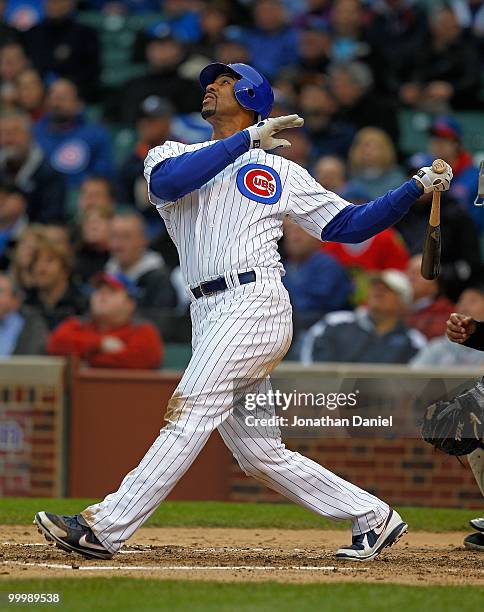 Derrek Lee of the Chicago Cubs hits the ball against the Florida Marlins at Wrigley Field on May 12, 2010 in Chicago, Illinois. The Cubs defeated the...