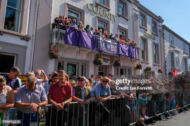 Spectators gather beneath the County Hotel balcony to watch the colliery bands during the 134th Durham Miners’ Gala on July 14, 2018 in Durham,...