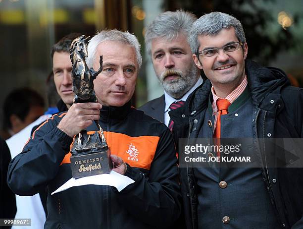 Head coach Bert Van Marwijk receives a Unicorn from Seefeld's mayor during the Dutch team's arrival for their training camp in the Tyrolian village...