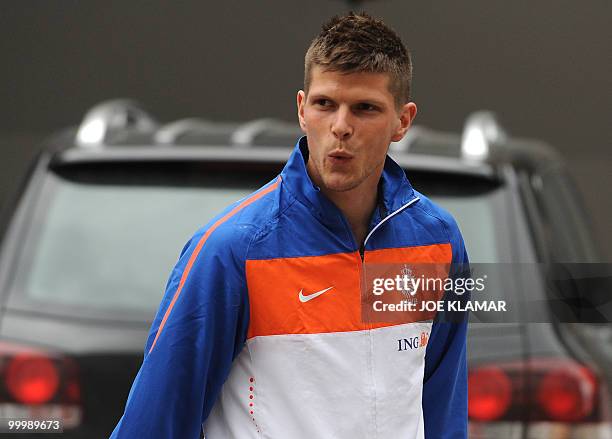 Dutch football player Klaas-Jan Huntelaar reacts as he arrives with Netherlands national football team at their training camp in Tirolian village of...