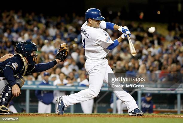 Jamey Carroll of the Los Angeles Dodgers bats against the Milwaukee Brewers at Dodger Stadium on May 6, 2010 in Los Angeles, California.