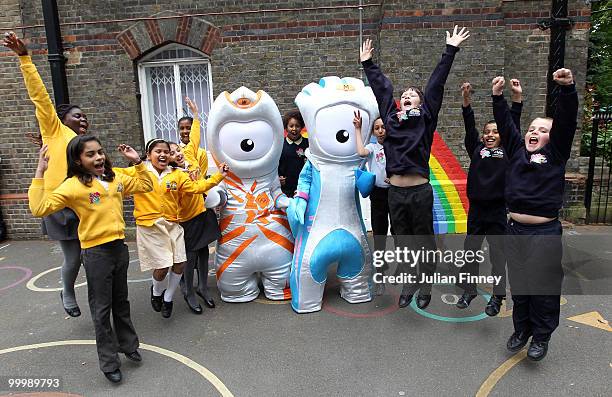 Wenlock, the Olympic mascot and Mandeville , the Paralympic mascot pose with school children after being unveiled at St Pauls Whitechapel C of E...