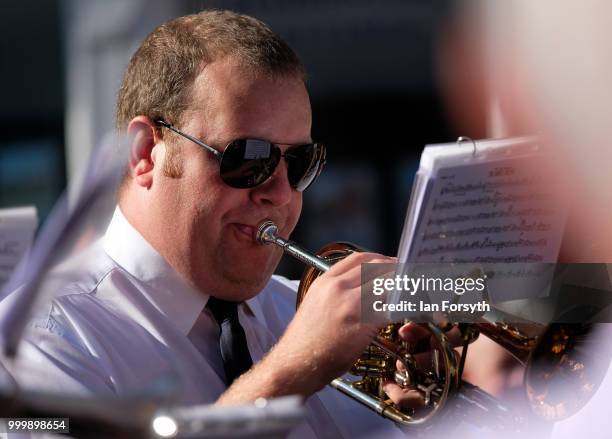 Band member plays in front of the County Hotel as he performs during the 134th Durham Miners’ Gala on July 14, 2018 in Durham, England. Over two...