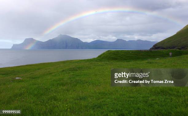 rugged landscape around gjógv - temas stock pictures, royalty-free photos & images